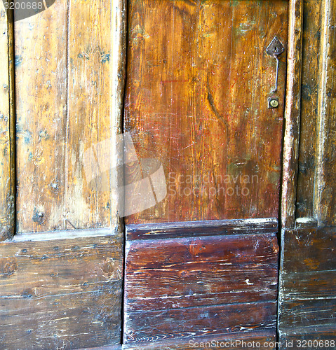 Image of  venegono abstract  rusty   door c   closed wood  italy  varese