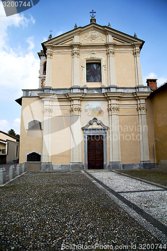 Image of  church  in  the somma lombardo old   closed brick tower  