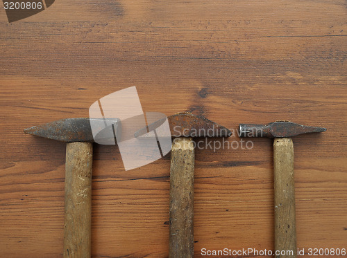 Image of Hammer on wood