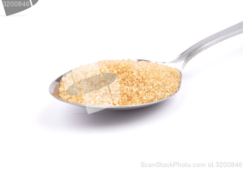 Image of Brown cane sugar on spoon