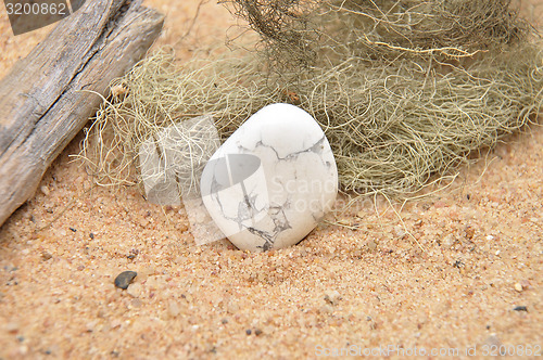 Image of Howlite on beach