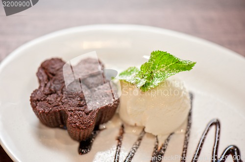 Image of chocolate cake with ice cream