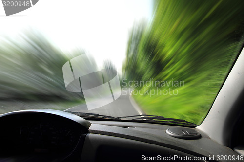 Image of car view on the sprig road