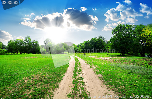 Image of Sun and country road