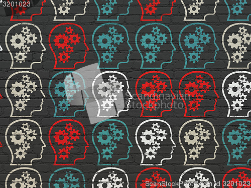 Image of Business concept: multicolor Head With Gears icons on wall background