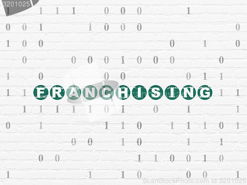 Image of Finance concept: Franchising on wall background