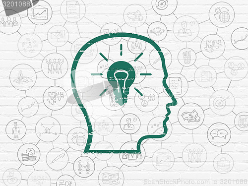 Image of Finance concept: Head With Lightbulb on wall background