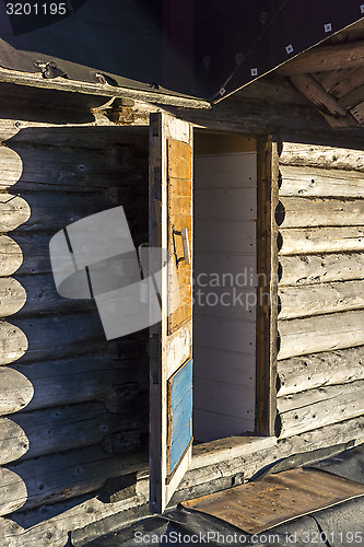 Image of Entrance to the old wooden Russian bath house 