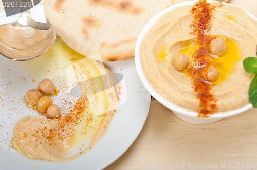 Image of Hummus with pita bread 