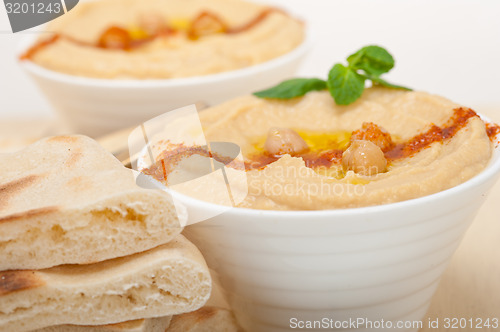 Image of Hummus with pita bread 