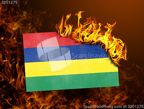 Image of Flag burning - Mauritius