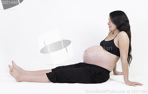 Image of pregnant woman sitting