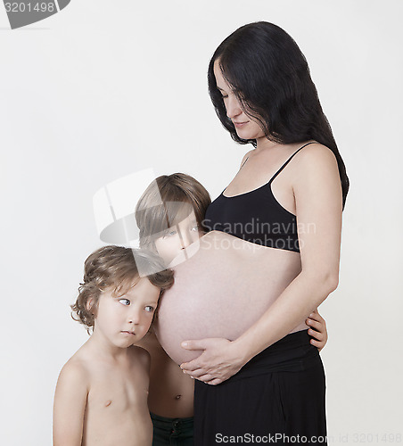 Image of Children with pregnant mother