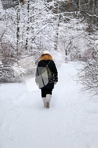 Image of woman walks down  