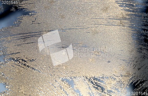 Image of Snowflakes frozen glass 