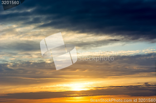 Image of Sunset / sunrise with clouds.