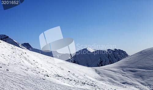 Image of Off-piste slope at nice sunny day