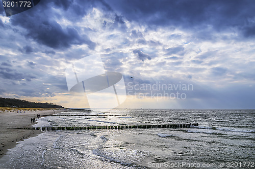 Image of Coast of Baltic Sea with dark clouds