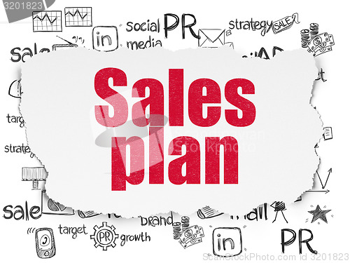 Image of Advertising concept: Sales Plan on Torn Paper background