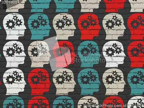 Image of Marketing concept: multicolor Head With Gears icons on wall background