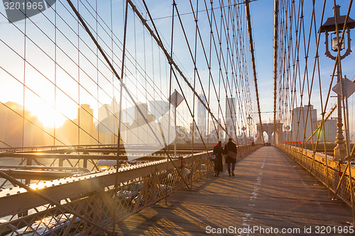 Image of Brooklyn bridge at sunset, New York City.