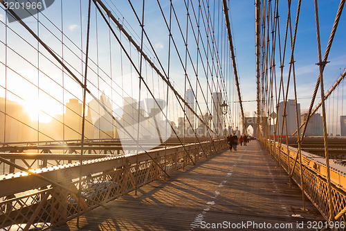 Image of Brooklyn bridge at sunset, New York City.