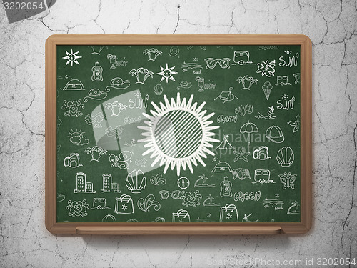 Image of Travel concept: Sun on School Board background