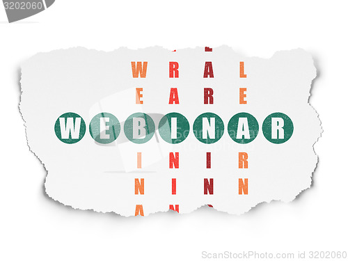 Image of Education concept: word Webinar in solving Crossword Puzzle