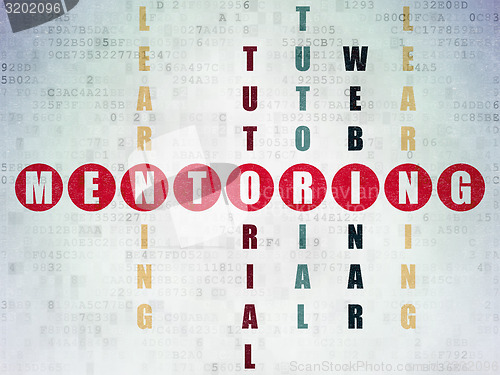 Image of Education concept: word Mentoring in solving Crossword Puzzle