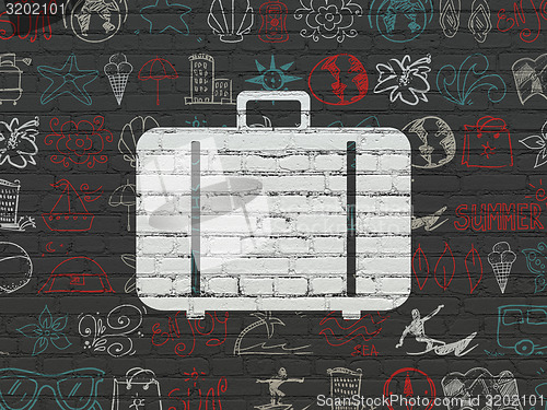 Image of Vacation concept: Bag on wall background
