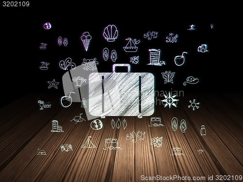 Image of Travel concept: Bag in grunge dark room