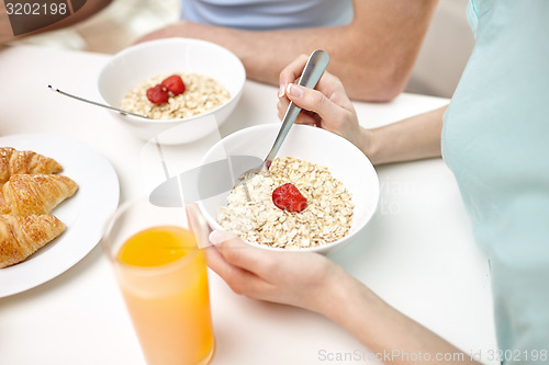Image of close up of couple having breakfast at home