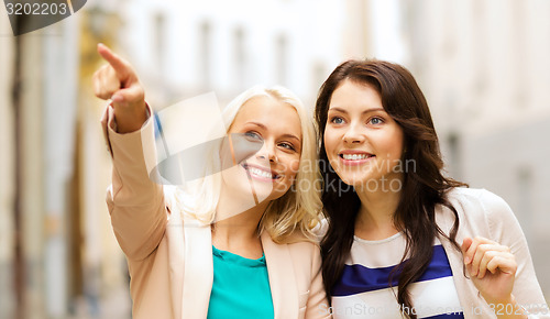 Image of girls with shopping bags in ctiy