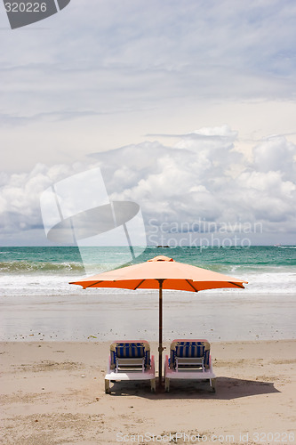 Image of Two Chairs at the Beach