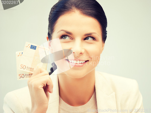 Image of lovely woman with euro cash money