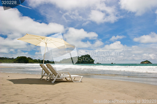 Image of Two Chairs at the Beach