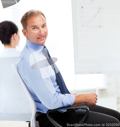 Image of businessman on business meeting in office