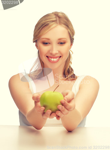 Image of woman with green apple