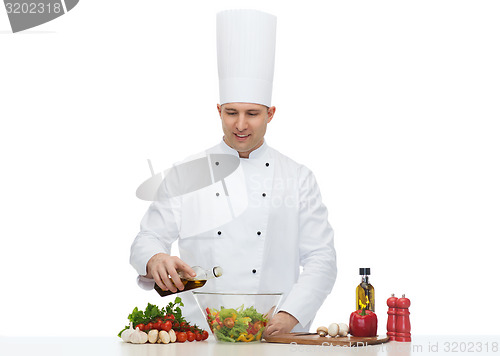 Image of happy male chef cook cooking food