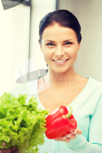 Image of beautiful woman in the kitchen