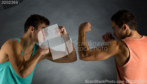 Image of young men wrestling