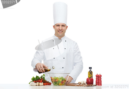 Image of happy male chef cook cooking food