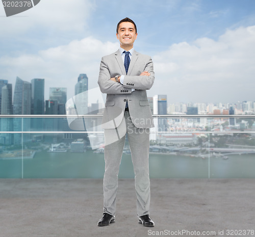 Image of happy smiling businessman in suit