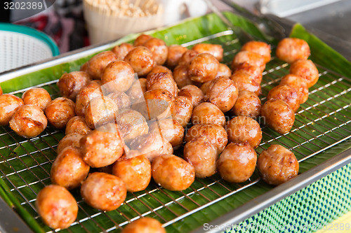Image of fried meatballs sale at street market