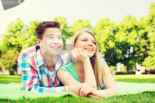 Image of smiling couple in park