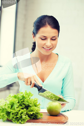 Image of beautiful woman in the kitchen