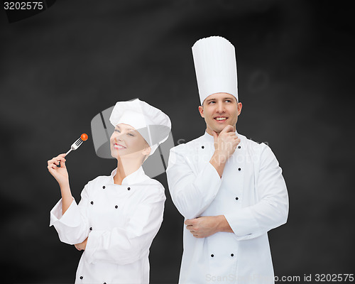 Image of happy male chef cook thinking