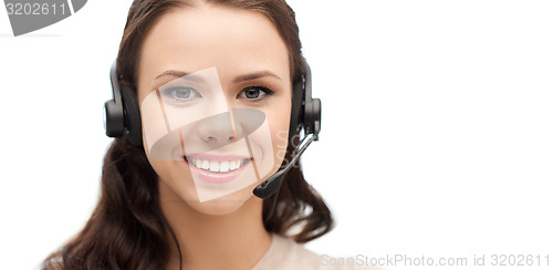 Image of friendly female helpline operator with headphones