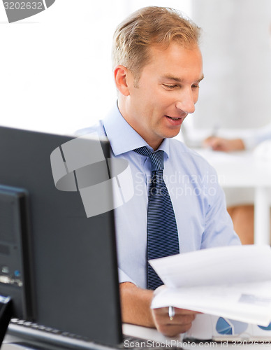 Image of businessman with documents