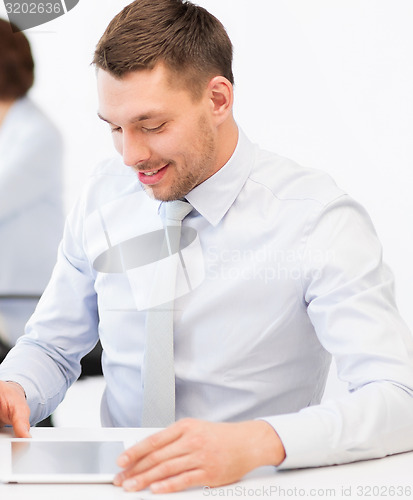 Image of businessman with tablet pc